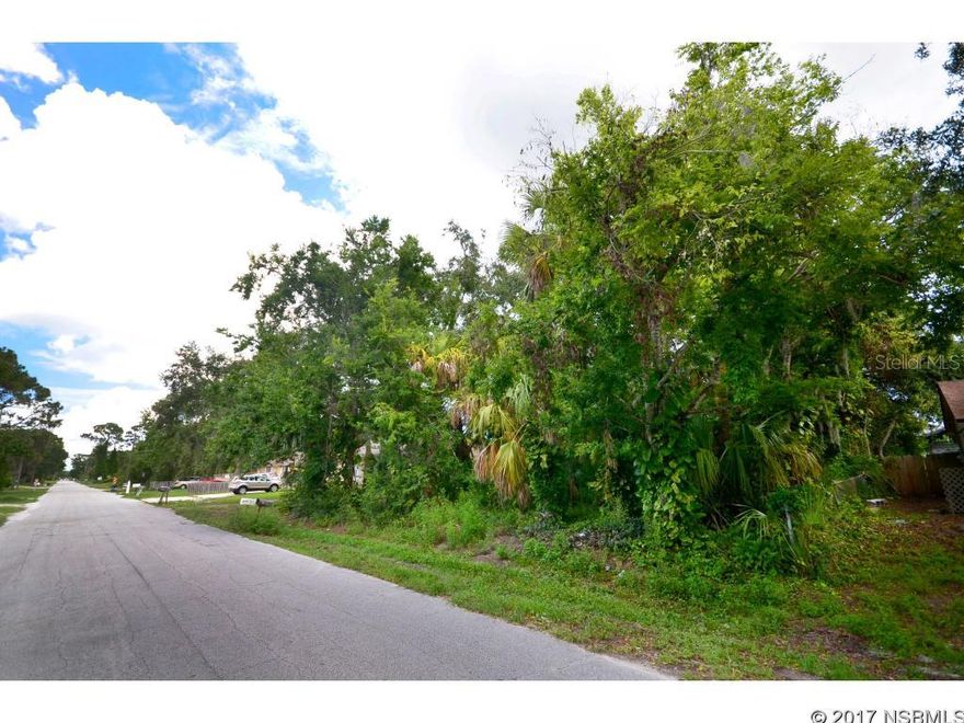 This 80'x125' building site in Florida Shores is zoned R-4, which allows for single family or multi-family home or duplex. Central location is close to the river, schools and shopping.; Cleared: No ;Water: Available at Site