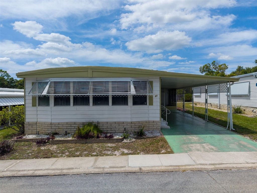 Photo of 23 Mountain Laurel Drive, Palm Harbor, FL 34684 (MLS # TB8490077)