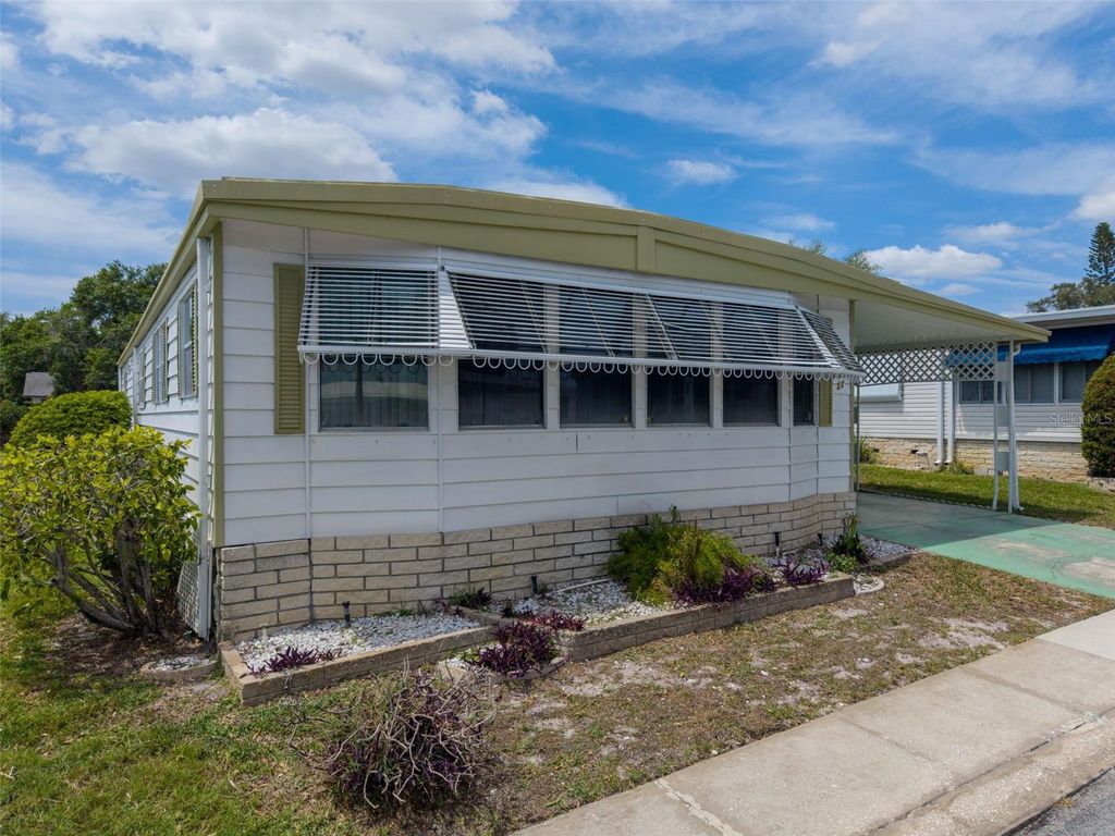 Photo of 23 Mountain Laurel Drive, Palm Harbor, FL 34684 (MLS # TB8490077)