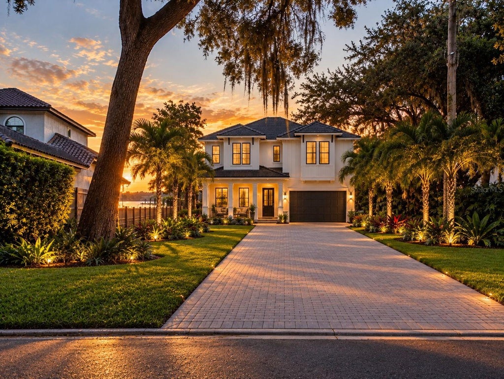 Photo of 14808 Lake Magdalene Circle, Tampa, FL 33613 (MLS # TB8549282)