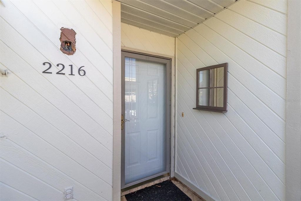 Photo of 2216 Oak Wind Drive, Holiday, FL 34691 (MLS # TB8492620)