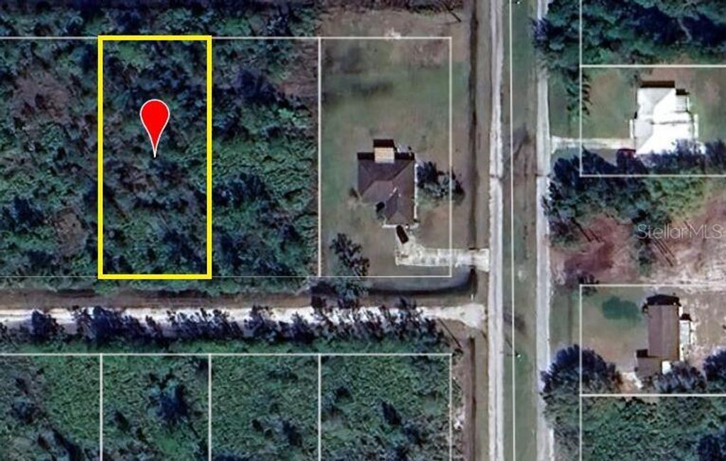 Photo of 6 Bougainville Drive, Indian Lake Estates, FL 33855 (MLS # O6355134)