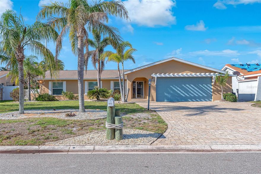 WATERFRONT ~ BOAT LIFT ~ POOL ~ HOT TUB ~ COMPLETELY RENOVATED ~ NEW KITCHEN ~ NEW APPLIANCES ~ NEW A/C ~ STUNNING SUNSETS ~ Welcome to this beautifully updated 3-bedroom, 2-bathroom pool, with a free standing hot tub home located on a deepwater canal with direct access to Tampa Bay. The home features a fully updated kitchen, brand new stainless steel appliances. The primary bedroom has convenient access to the patio and pool area. The expansive lanai is an entertainer's dream. With pocketing sliders and windows, you can open up the main living area to the outdoors, creating a seamless flow. This home offers a dock with a boat lift for boating enthusiasts. With no HOA and no CDD, you’ll enjoy ultimate flexibility. Positioned in a prime Apollo Beach location, this home is close to marinas, restaurants, shopping, and essential service all just 30 minutes from Tampa International Airport. The best of Florida living is right here, where you can watch the sunrise and sunset and see the dolphins playing in the canal. Schedule your private showing today.