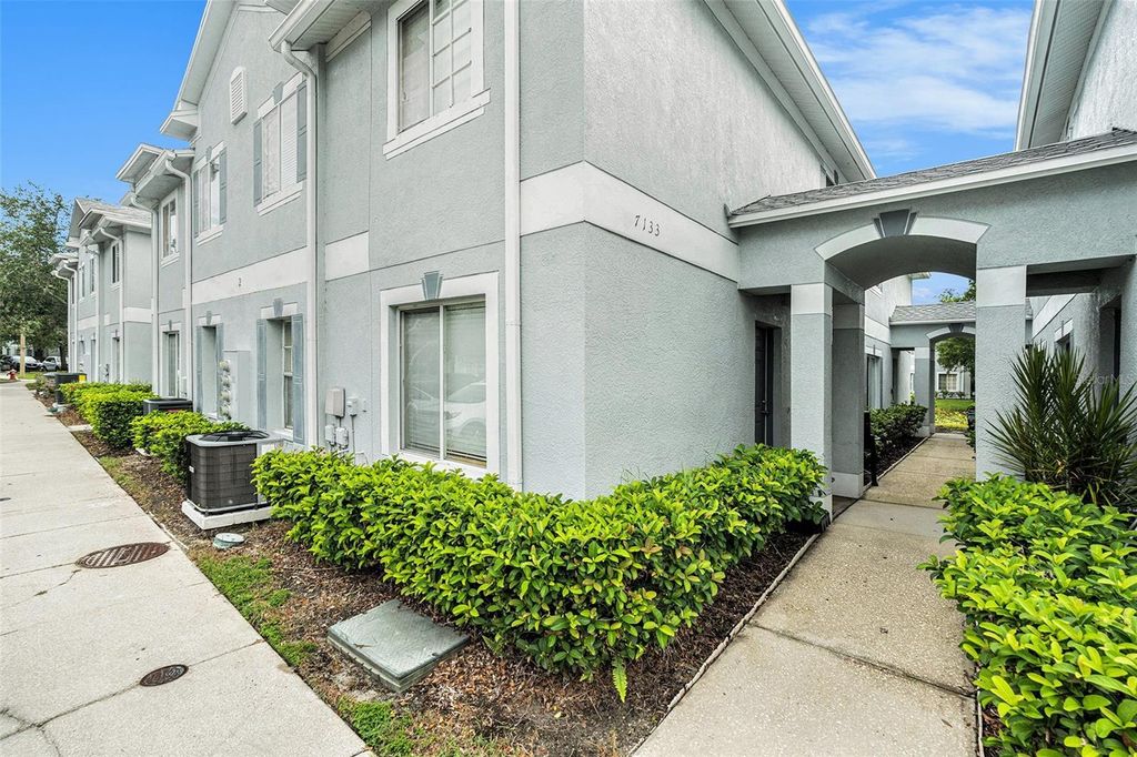 Photo of 7135 Waterside Drive, Tampa, FL 33617 (MLS # TB8403472)