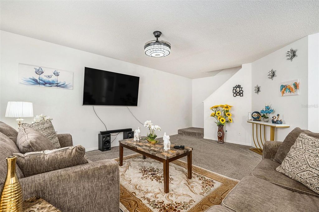 Photo of 7135 Waterside Drive, Tampa, FL 33617 (MLS # TB8403472)