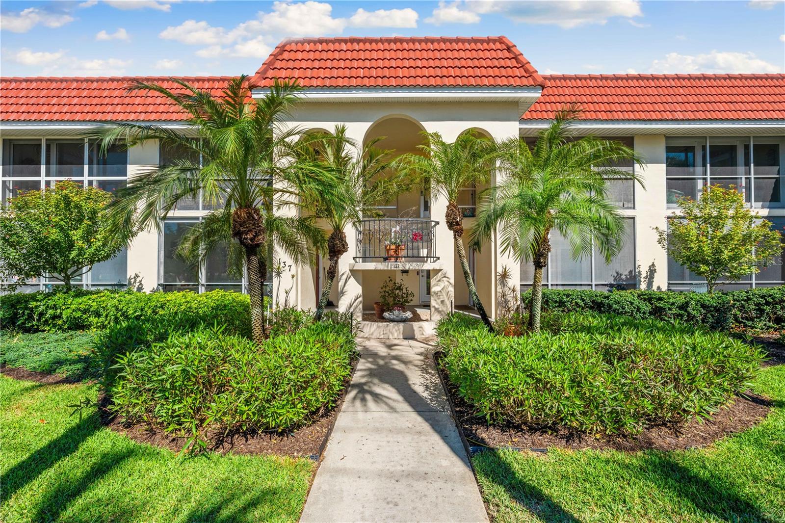 Perfectly situated just one block from the heart of Siesta Key Village and a mere two blocks from the pristine white sands of the renowned Siesta Key Beach, this Villa Navarra condominium offers an enviable location. Surrounded by lush tropical landscaping, this rare exclusive gem is one of only 16 units, featuring newer PGT windows and sliding glass doors. Recently renovated with the utmost attention to detail and adorned with the finest finishes and furnishings, it exudes modern elegance. Conveniently situated on the ground floor, you'll enjoy seamless access in and out through your back door, leading directly to your designated parking space. Alternatively, you can hop aboard the complimentary daily trolley, which makes multiple convenient stops throughout Siesta Key. Indulge in the vibrant ambiance of Siesta Key Village, offering an eclectic mix of shopping and dining experiences, from laid-back island-style entertainment to a variety indoor venues. This premium location is conveniently located less than a quarter-mile from Siesta Key Beach. Enjoy America's favorite beach destination with the luxury of a new home feel. ***Available 9/15/25