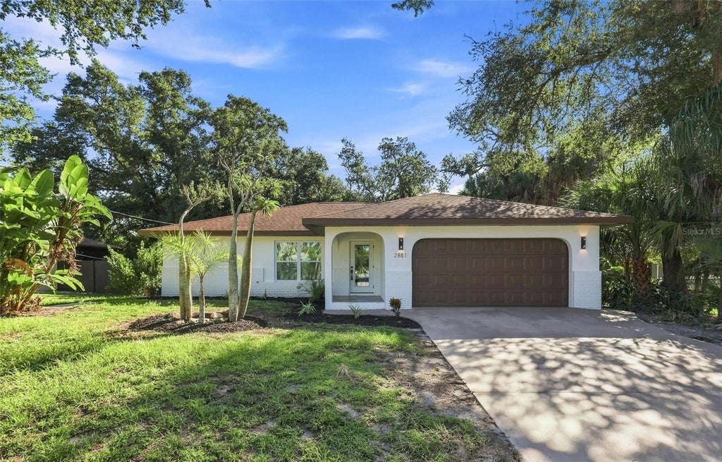 Photo of 2881 Poppy Road, Venice, FL 34293 (MLS # O6432255)