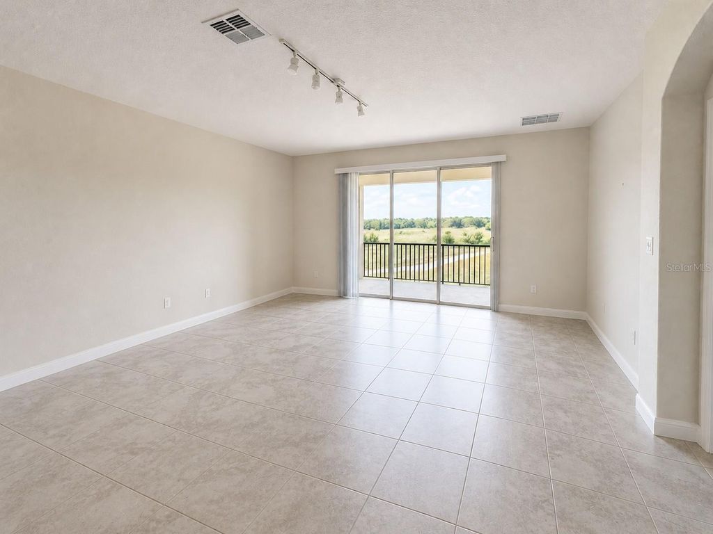 Photo of 505 Ocean Course Avenue #505, Davenport, FL 33896 (MLS # S5149061)