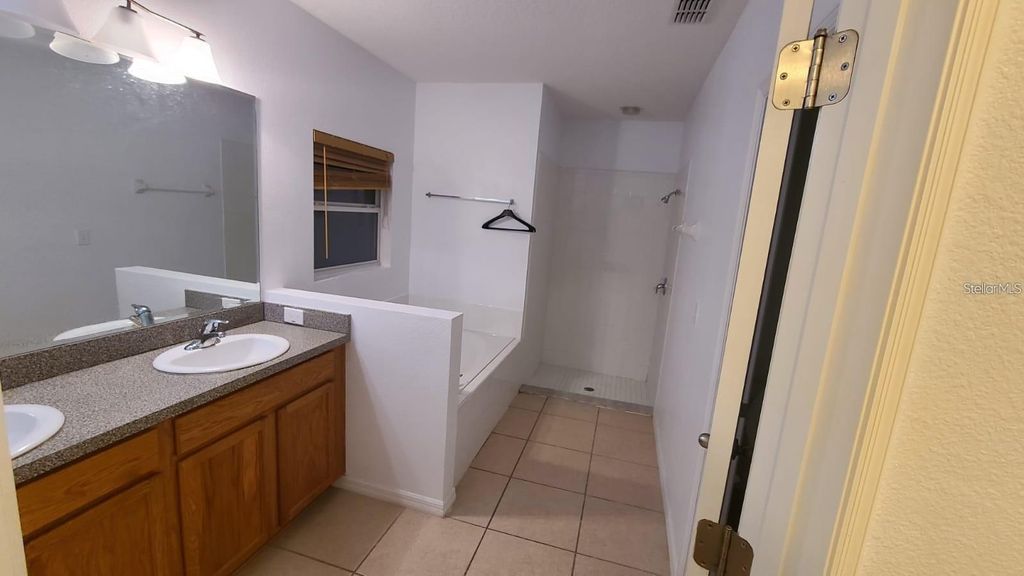 Photo of 10752 Clover Walk Drive, Orlando, FL 32825 (MLS # O6386463)