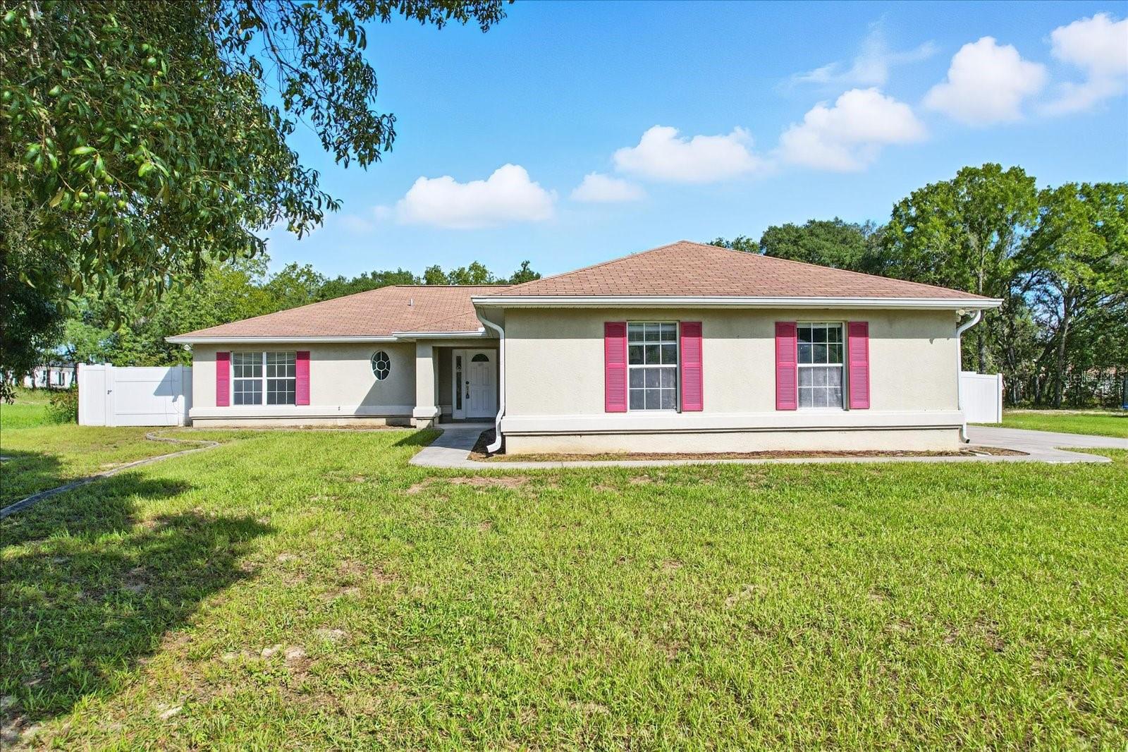 Discover the comfort and convenience of this 2005-built 3-bedroom, 2-bath home in Marion Oaks, offering 1,434 sq. ft. of living space on nearly half an acre with a desirable split-bedroom layout, durable tile flooring throughout the main areas, modern LVP in the bathrooms, an inside laundry room, and a rare 3-car garage. The fully fenced yard provides privacy and room to enjoy the outdoors, while the home’s location places you just minutes from highways, schools, dining, shopping, and all that Ocala has to offer, making it an ideal blend of space, function, and accessibility. Call for your showing today!