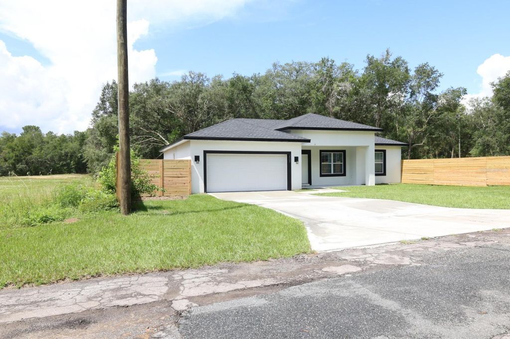 Photo of 2522 W Castle Road, Dunnellon, FL 34434 (MLS # TB8467459)