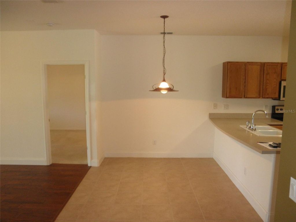 Photo of 9301 Venezia Plantation Drive, Orlando, FL 32829 (MLS # O6372482)