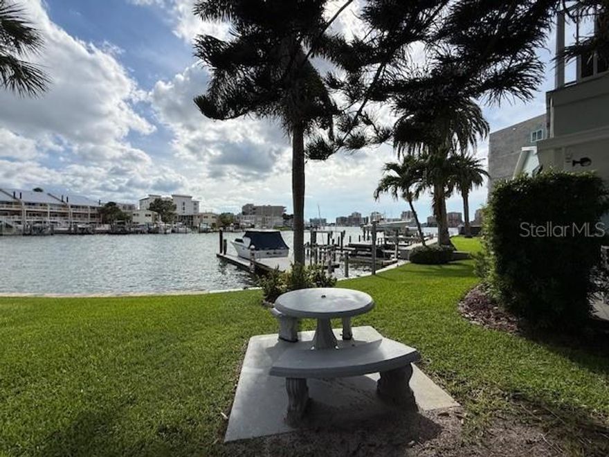 WATERFRONT UNIT on ISLAND ESTATES-will do long Terrm-3bdrm 2bathroom Fully furnished and equipped. Perfect for the person needing 2bdrms and an office. Rent Includes -washer & dryer, cable, internet, water & trash. Nicley updated kitchen with wood cabinets and granite counters, high top dining table, spacious living area with sliding doors to a waterfront patio. . There is also a resident dock for all residents to use. this condo is located in the sought after ISLAND ESTATES WATERFRONT COMMUNITY with everything you need at your fingertips. grocery, gas station, Fine & Casual Dining, UPS/post office, ER clinic, hair salon etc. walk jog ride bike or hop on the Trolley right on over to CLEARWATER BEACH, there you'll find the sand and many more restaurants, PLUS Pier60, fishing, sightseeing, dolphin watching & go-fast boats. ALWAYS SOMETHING GOING ON AT THE BEACH- Sandcastle exhibit, seafood festival, boat races, iron man races, movies at Pier60, artisans and plenty more!  come once and you won't want to leave!