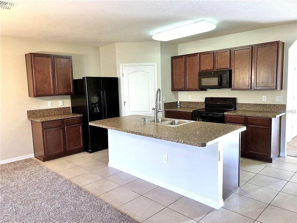 Photo of 3045 Sangria Street, Kissimmee, FL 34744 (MLS # O6362797)