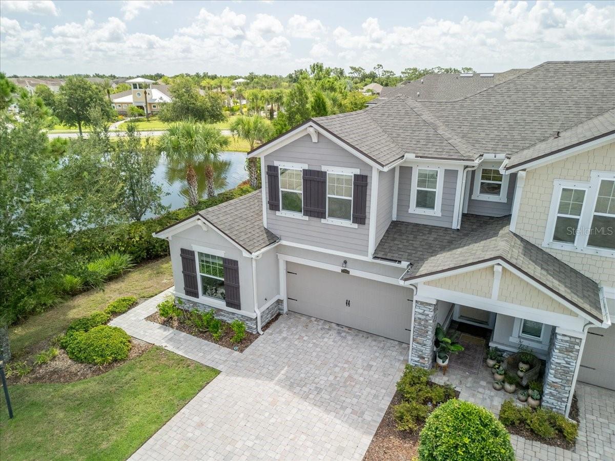 LOCATION & PRIVACY! This beautiful end-unit townhome in Harmony at Lakewood Ranch offers exceptional privacy, a tranquil pond view, and is ideally situated in a quiet cul-de-sac. Featuring 3 bedrooms and 3 full bathrooms, this home includes a converted loft guest suite complete with an en-suite bath, wet bar, a spacious walk-in closet, and a large second-floor storage room—perfect for guests or multigenerational living.
The kitchen boasts soft-close cabinets, under-cabinet lighting, a kitchen island, pantry, and premium appliances in both the kitchen and laundry room. Additional highlights include no carpets (!!), tile and engineered hardwood floors, high ceilings, ceiling fans throughout, and a new roof for added peace of mind.
Enjoy the convenience of a 2-car garage and driveway, community sidewalks and walking trails, and resort-style amenities including a clubhouse, fitness center, playground, and a newly renovated community pool.
Centrally located with easy access to SR-70, I-75, Lakewood Ranch Blvd, and minutes from top-rated schools, LECOM, Main Street at Lakewood Ranch, and the lively Waterside district. Don’t miss this opportunity to live or invest in the nations #1 multigenerational master-planned community!