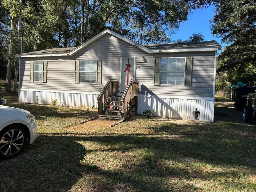 Super Cute Double Wide Mobile Home on a 1 acre lot.  Abandoned Rock Quarry next door that you own access to for fishing and trail rides.  Walk-in Tub in Master bath.  Close to downtown, shopping, doctors, etc.  Go take a look, you might just find what you have been looking for in a home.