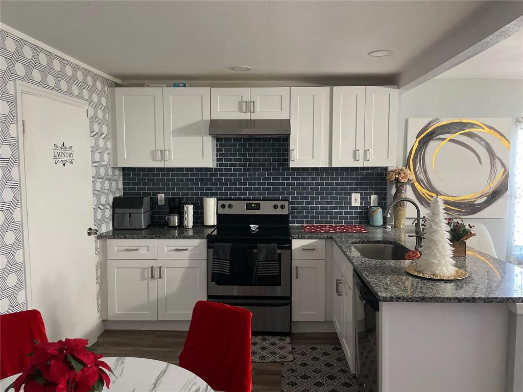 Photo of 2014 W Hickory Street, Lakeland, FL 33815 (MLS # O6368152)