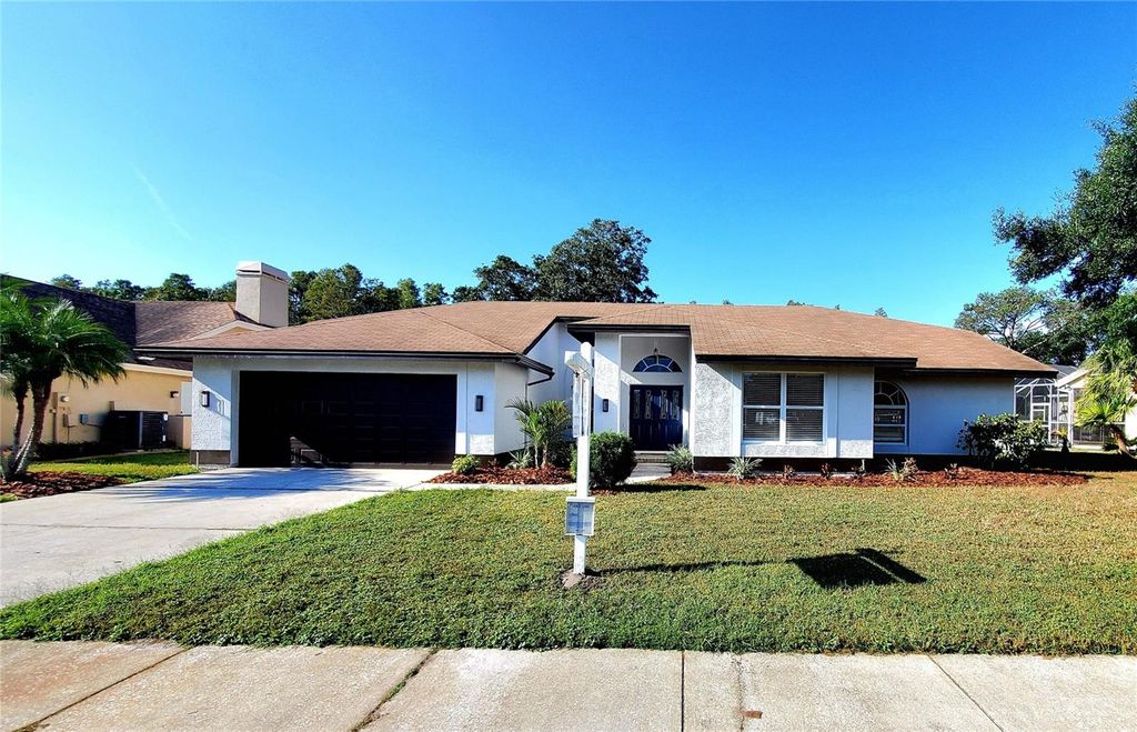 Photo of 382 Waterford Circle E, Tarpon Springs, FL 34688 (MLS # TB8420596)