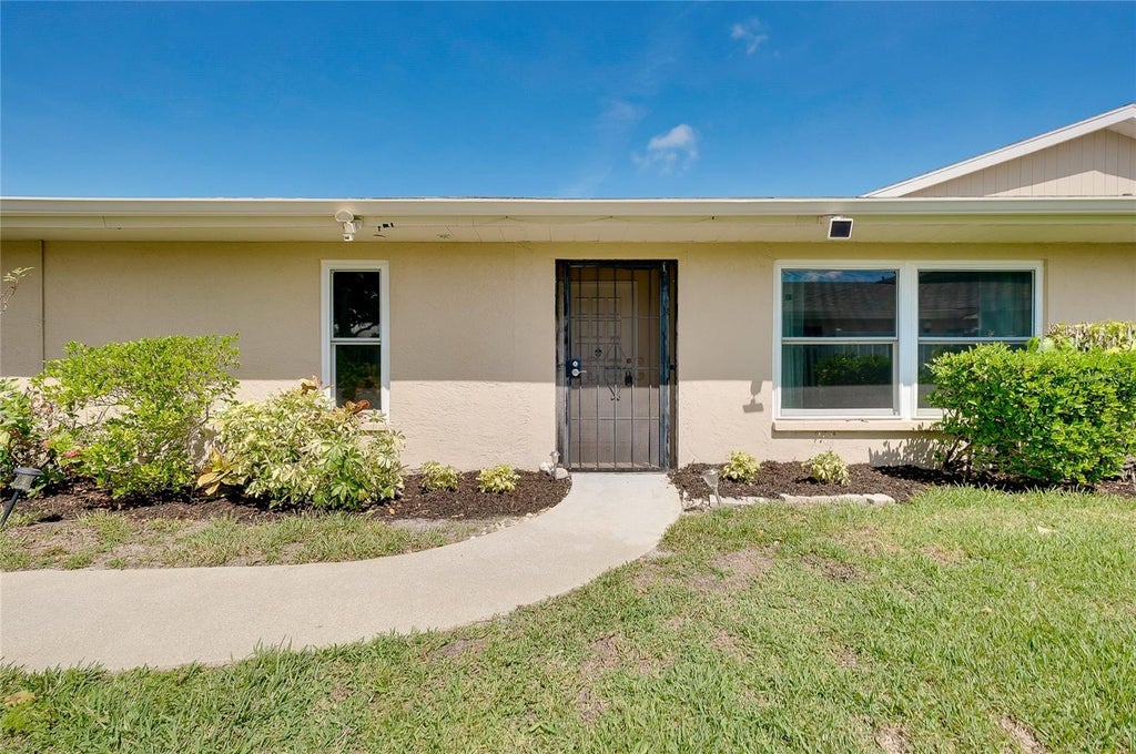 Photo of 5617 Evergreen Dr #27, Sarasota, FL 34233 (MLS # A4697419)