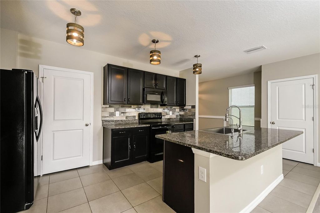 Photo of 4106 Willow Hammock Drive, Palmetto, FL 34221 (MLS # C7522289)