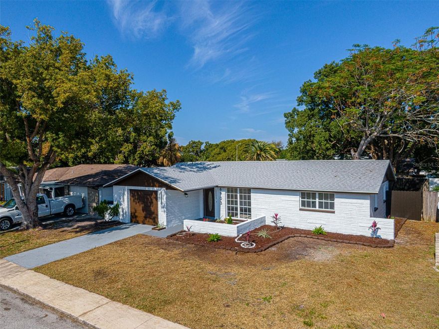 Welcome to this beautifully updated Florida residence, perfectly situated on a private homesite with no HOA and no flood zone. This move-in-ready property offers 3 spacious bedrooms and 2 fully renovated bathrooms, thoughtfully designed to provide comfort, style, and long-term peace of mind.

Inside, the home showcases a modern interior featuring new wood cabinetry, updated quartz countertops, and luxuriously remodeled bathrooms (2025). The brand-new luxury vinyl flooring (2025) enhances the home’s contemporary aesthetic while offering durability and easy maintenance. Additional major improvements include a new roof (2025), new A/C system (2025), and a new water heater, ensuring reliable performance for years to come. The property also offers a generous garage for added convenience and storage.

The exterior is equally impressive. A new aluminum fence provides privacy and security—ideal for pets, gatherings, or quiet outdoor enjoyment. The backyard features a shade sail, creating a comfortable outdoor retreat for relaxing afternoons. Fresh interior and exterior paint (2025) complete the home’s crisp, polished look and contribute to its excellent curb appeal.

With its extensive updates and refined finishes, this property has been meticulously maintained and thoughtfully upgraded. Discover the perfect blend of style, comfort, and functionality—schedule your visit today before this exceptional home is gone.