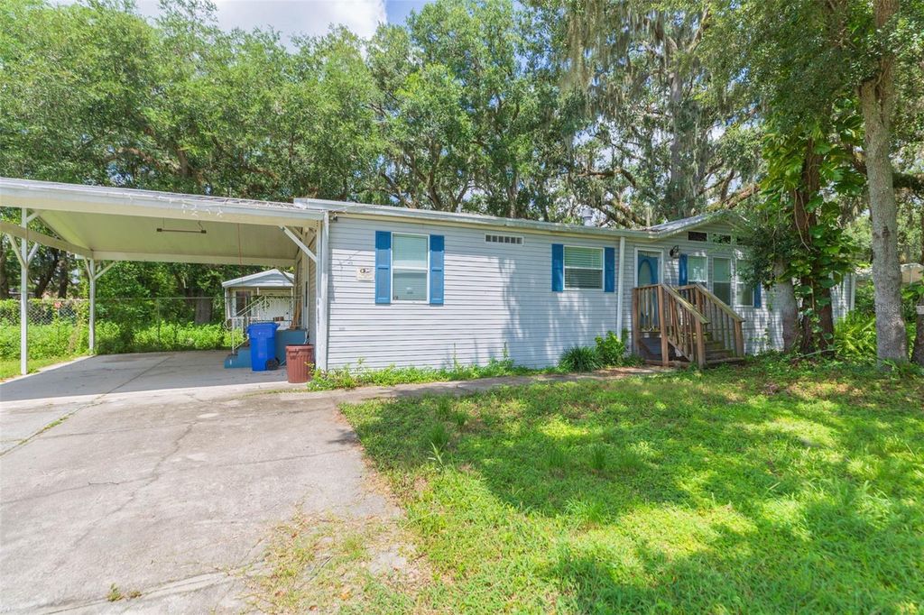 Photo of 9117 Wood Terrace Drive, Tampa, FL 33637 (MLS # TB8413707)
