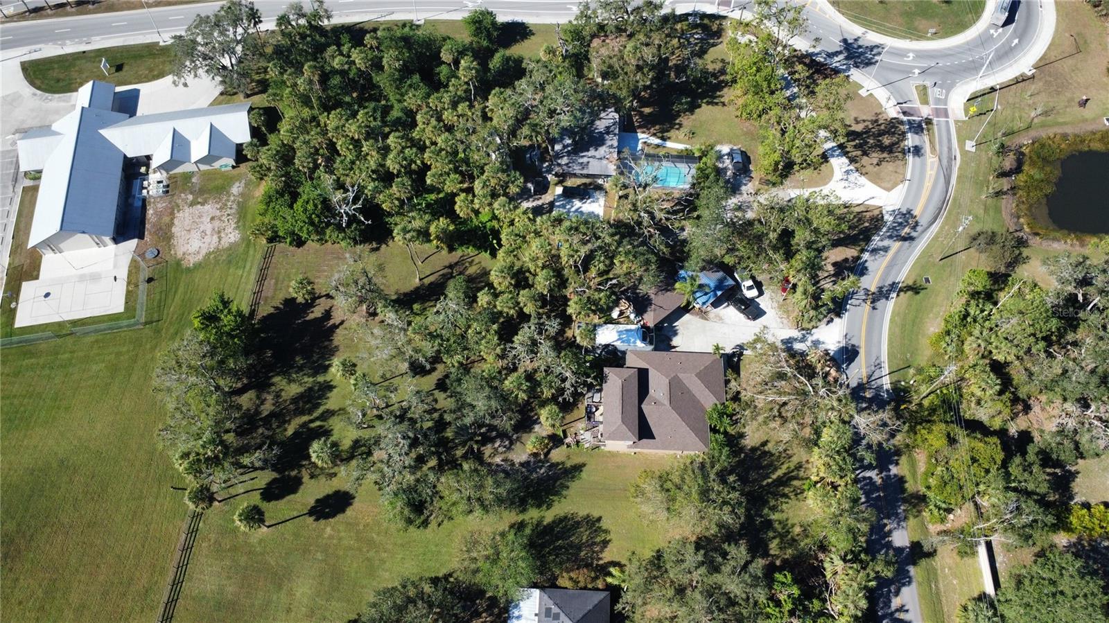 1.04 acres zoned (PED) Planned Economic Development located in the area of major development in popular Lakewood Ranch. Flood zone X, outside 100/500 year floodplain. Can be assembled with 3 additional contiguous parcels for a total of 3.31 acres. (2190 Lakewood Ranch Blvd – PID 0214150008, 6440 Richardson Rd – PID 0214150006 and 6480 Richardson Rd. – PID 0214150010) and 6500 Richardson rd. This property and the 3 contiguous properties are being sold as Vacant Land and the house structure will be sold at zero value. This is the highest and best use of land with PED zoning. Near shopping, restaurants, and plenty of progress. House being included at zero value. The value is in the land.