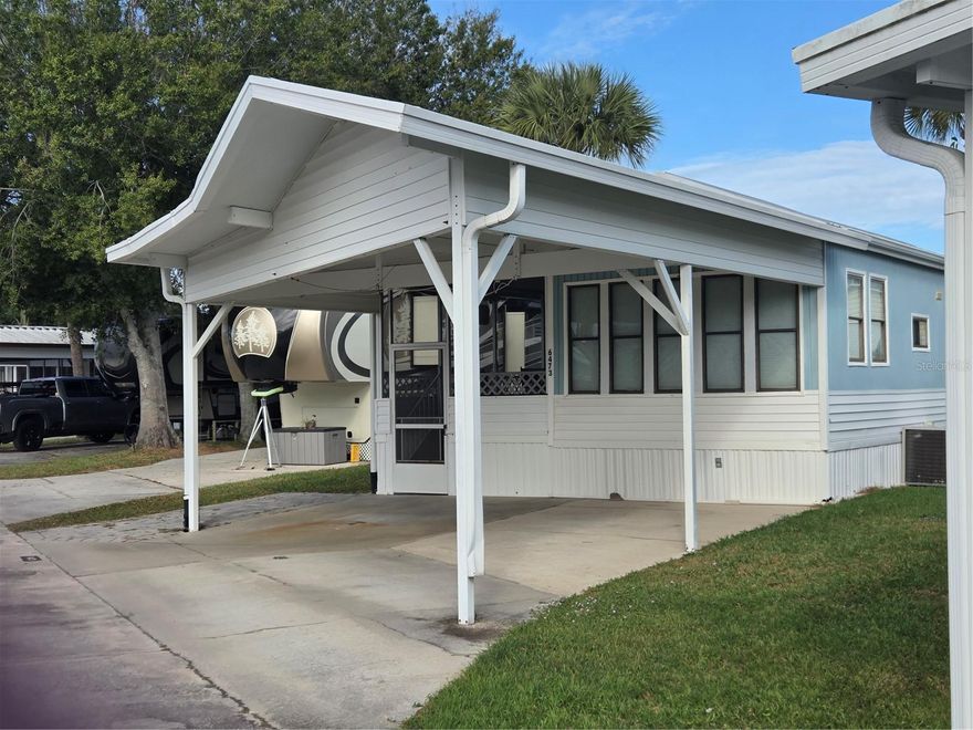 ANCIENT OAKS 55+COMMUNITY RV RESORT 1/BED 1/BATH PARK MODEL FURNISHED AND MOVE IN READY. PORCH ADDITION OFFERS OUTSIDE LIVING SPACE FURNISHED AS WELL. LAUNDRY ROOM COMES WITH A  WASHER AND DRYER. SPACIOUS CARPORT. CONCRETE SLAB ON BACK SIDE AND SIDEWALK IN THE FRONT. THIS IS A DOUBLE LANE STREET. COMMUNITY OFFERS MANY AMMENITIES AND ACTIVITIES. DOG PARK, MARINA, BATH HOUSES. SWIMMING POOL, CLUBHOUSE, PICKLEBALL, SHUFFLEBOARD, ECT. TAKE A LOOK  AND MAKE THIS HOME YOURS.