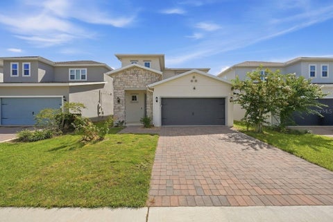 Photo of 4700 Cragmere Loop, Clermont, FL 34711 (MLS # O6439771)