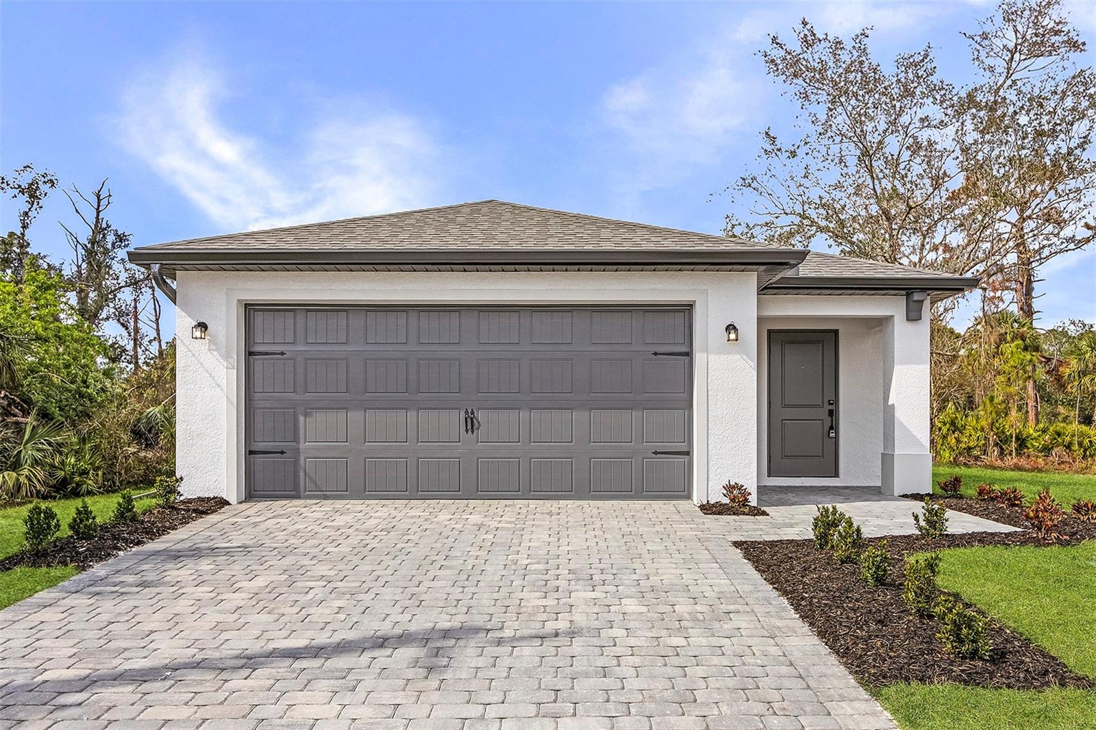 PRICE REDUCED! MOVE IN READY! The Captiva by LGI Homes is a beautifully designed 3-bedroom, 2-bathroom home in North Port, offering the perfect balance of style and functionality. The open-concept living area is ideal for entertaining, while the spacious master suite with a walk-in closet provides a peaceful retreat. Two additional bedrooms present plenty of space for family or guests. Enjoy the Florida sunshine on the inviting back patio, perfect for relaxation and gatherings. This home is an exceptional choice for creating lasting memories with your loved ones.