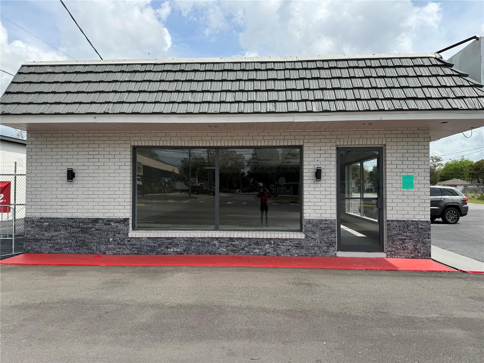 Prime Commercial Corner Property located on N. Nebraska Avenue. Perfect for owner user/Investor plus room to rent out additional space for income. The building has been remodeled inside and out with updated bathrooms. Separate entrance provides convenient access with a roll-up door for larger deliveries. The property includes large attached sign on building plus a double sided pole sign for advertising they are wired, buyer will have to connect to power. Building wired for security system. Parking lot repaired, asphalt seal coat was applied to existing parking and additional asphalt parking spaces were added to the property. Potential users for this property is endless!!!