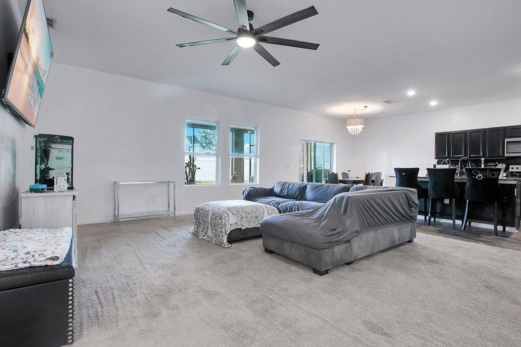 Photo of 258 Hidden Lake Loop, Haines City, FL 33844 (MLS # G5111304)