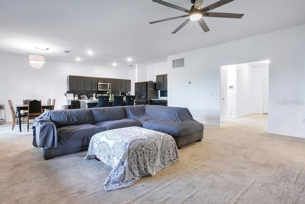 Photo of 258 Hidden Lake Loop, Haines City, FL 33844 (MLS # G5111304)