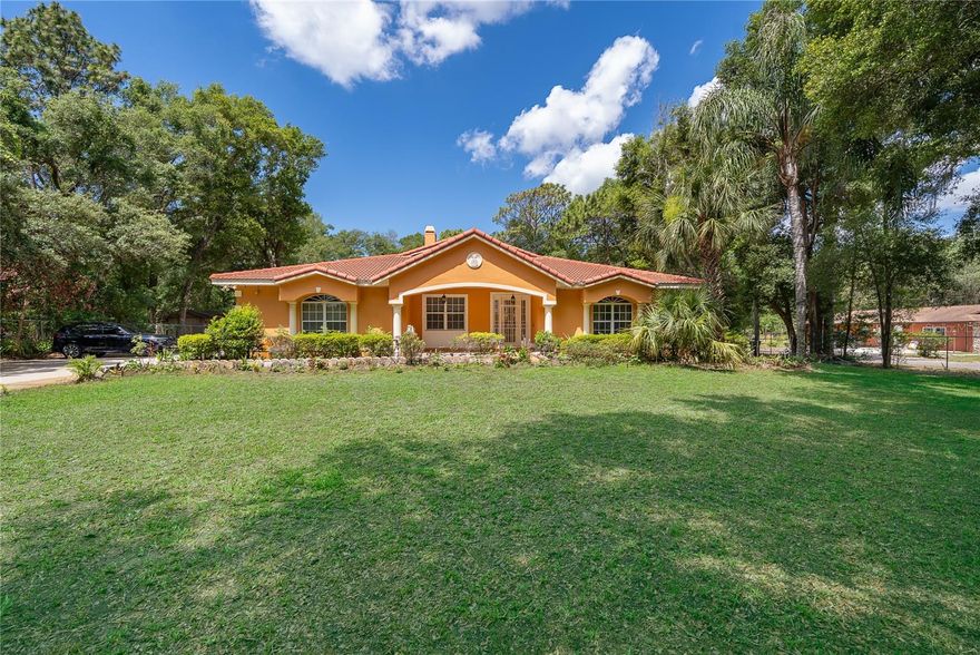 Offered for the first time, 5948 Lakeville Road presents a rare opportunity to own a spacious POOL home on just over one fully fenced acre with NO HOA.

With more than 3,000 square feet of living space, this 4-bedroom, 3-bath residence was designed with flexibility in mind. In addition to the main living areas, the home includes a private IN-LAW SUITE with its own kitchenette, making it ideal for multigenerational living, extended guests, or a separate home office setup.

Inside, you’re welcomed by a grand foyer, luxury laminate flooring, and a formal sitting room. The kitchen features stainless steel appliances, solid wood cabinetry, granite countertops, a butler’s pantry, breakfast bar, and a large center island. The adjoining family room includes a wood-burning fireplace and sliding glass doors that lead to the screened lanai and private pool.

The primary suite offers a spacious retreat with a walk-in closet and an ensuite bath featuring dual vanities, a soaking tub, and a separate shower. Additional bedrooms and flexible living spaces provide room to accommodate a variety of needs.

Outside, the possibilities are endless. The cleared and fully fenced acre offers ample room for gardening, recreation, pets, storage, or future improvements, all surrounded by mature trees for added privacy. The property also provides access from both Lakeville Road and adjacent June Bug Road, offering added convenience and flexibility.

Homes offering this combination of over an acre of land, a private pool, an in-law suite, dual road access, and no HOA are hard to find. Conveniently located with access to shopping, dining, and major roadways, this property offers the space and versatility to make it your own. Schedule your showing today!