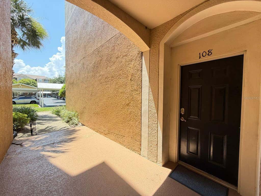 Photo of 6466 Cava Alta Drive #108, Orlando, FL 32835 (MLS # O6429475)