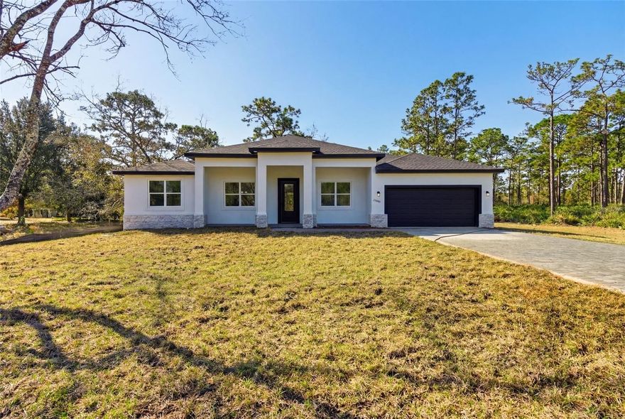 Brand new construction in Wedgefield offering privacy, acreage living, and no HOA restrictions on a 1.22-acre homesite.

This beautifully designed 4-bedroom, 3-bath home features an open-concept layout with tray ceilings in the main living area and incredible natural light throughout. The gourmet kitchen is thoughtfully designed with stainless steel appliances, double wall ovens, a waterfall island, and a spacious walk-in pantry.

The primary suite offers a relaxing retreat with a spa-inspired bathroom featuring a freestanding soaking tub, glass-enclosed shower, and dual vanities.

Luxury vinyl flooring flows through the main living spaces, and the seamless layout connects the kitchen, dining, and living areas, perfect for entertaining or everyday comfort.

Enjoy the freedom to create your dream outdoor space with room for a pool, workshop, RV, boat, or simply added privacy — all on over an acre of land. Where privacy, space, and modern design come together in one exceptional property.

Conveniently located just 15 minutes to Avalon Park, under 30 minutes to Downtown Orlando, and approximately one hour to Cocoa Beach.