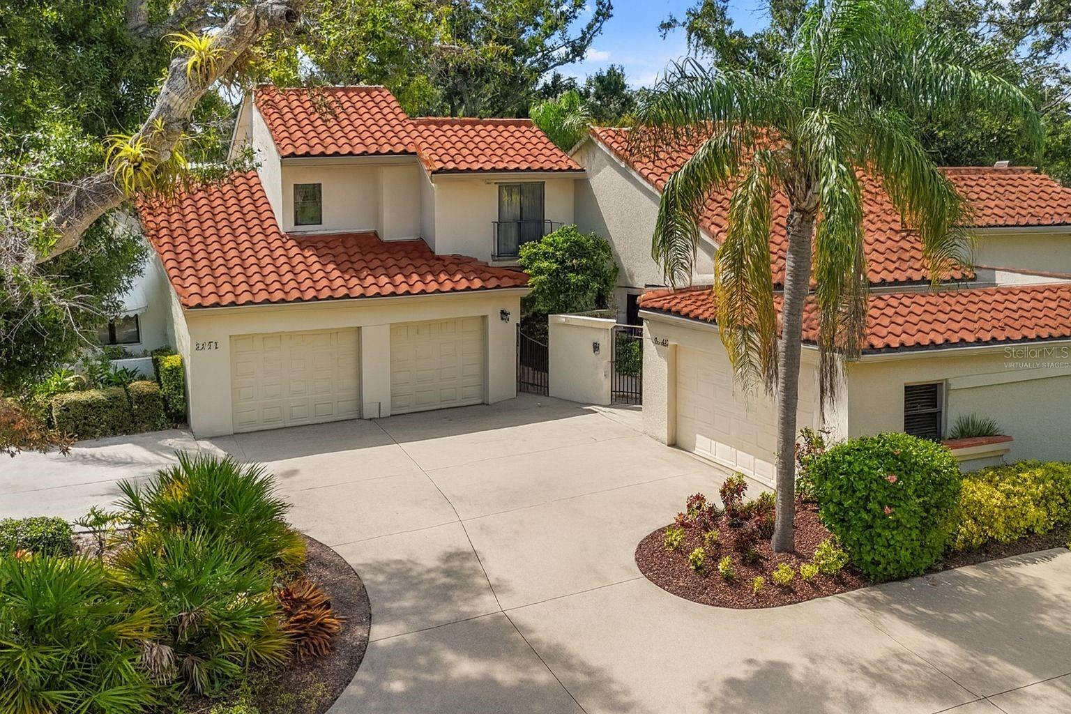 One or more photo(s) has been virtually staged. Welcome to 5289 Tivoli Ave—an updated Sarasota villa that perfectly blends comfort, convenience and low-maintenance living. Step through the charming courtyard entrance into a beautifully renovated home featuring brand-new flooring, a modern kitchen with updated cabinetry and
countertops, and refreshed bathrooms for a move-in-ready feel. The spacious primary bedroom offers peaceful lake views, perfect for starting
your day with a dose of serenity. Located in a well-maintained community, your HOA covers exterior maintenance, roof, and painting—giving you more time to enjoy everything Sarasota has to offer. Just minutes from the UTC Mall, MOTE Aquarium, downtown dining, shopping, and worldrenowned beaches like Siesta Key and Lido Beach, this location can’t be beat. Whether you're looking for a seasonal retreat or full-time residence, this home offers the lifestyle you’ve been waiting for