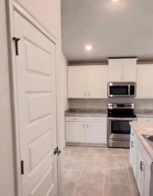 Photo of 583 Jett Ln, Davenport, FL 33837 (MLS # S5160140)