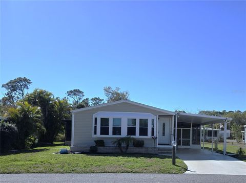 Photo of 722 Watersedge Street, Englewood, FL 34223 (MLS # N6142620)