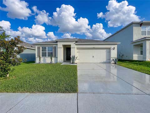 Photo of 148 Ludisia Loop, Davenport, FL 33837 (MLS # B4902299)