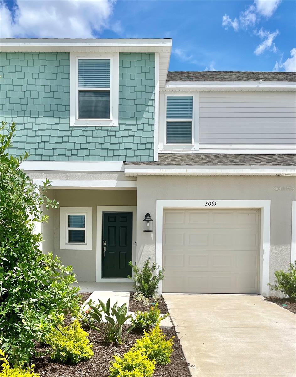 MLS#A4616861 New Construction- Ready Now! Welcome to the Jasmine townhome, offering approximately 1,373 square feet of living space, three bedrooms, two and a half baths, and a one-car garage. Enter from the front porch into the heart of this charming home, featuring a great room plan and an open kitchen with a large island perfect for entertaining and everyday meals. The first level includes a half bath, a one-car garage, and a spacious outdoor patio. Upstairs, you'll find two bedrooms with a full bath and a spacious primary suite with a walk-in closet and double vanity bathroom. The conveniently located laundry area is also on the second floor. Ample storage is available throughout, including under-stair storage, a large pantry, a linen closet, and three bedroom closets.