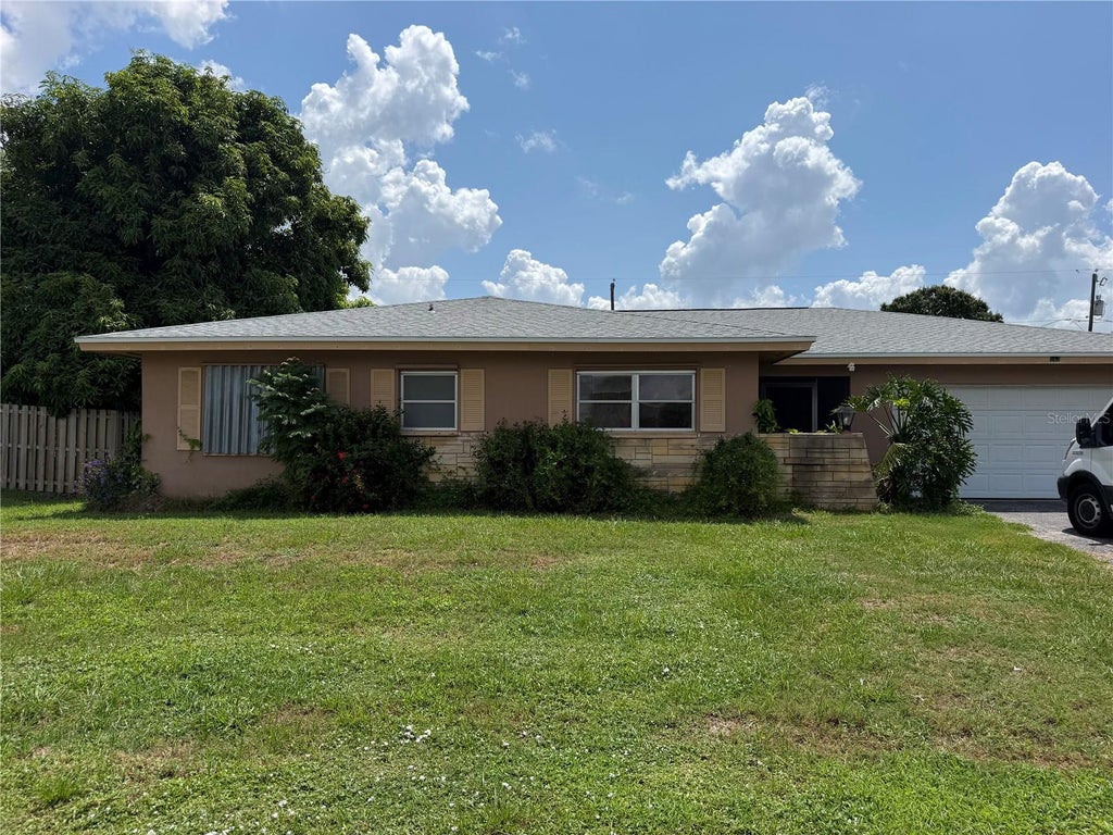 Photo of 563 Beal Street NW, Port Charlotte, FL 33952 (MLS # C7529613)