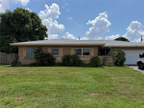 Photo of 563 Beal Street NW, Port Charlotte, FL 33952 (MLS # C7529613)