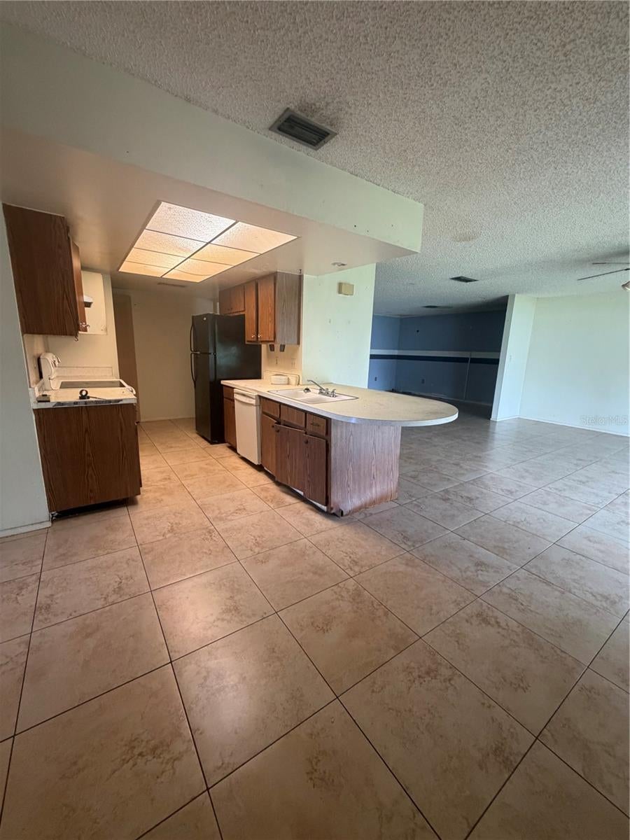 Photo of 563 Beal Street NW, Port Charlotte, FL 33952 (MLS # C7529613)