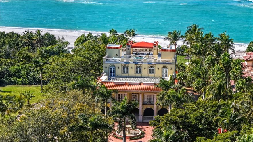 Positioned on the pristine shores of Sarasota’s Lido Key, 1067 Westway Drive presents a truly rare Gulf-front offering—defined by scale, privacy and irreplaceable land value. With over 100 feet of private, direct beachfront, this estate occupies one of the most coveted and increasingly scarce stretches of shoreline on Florida’s West Coast. Parcels of this size are rarely found, positioning this property as both a refined coastal retreat and a generational asset.

Designed to embrace its extraordinary setting, the residence unfolds with light-filled interiors, grand architectural moments and uninterrupted turquoise Gulf views from nearly every living space. A dramatic atrium entry and marble staircase lead to expansive rooms where soaring ceilings, bespoke detailing and walls of glass blur the line between indoors and out. The welcoming great room opens effortlessly into an expansive beachfront terrace - offering front-row views of endless sunsets over the Gulf of Mexico.  The home is equally suited for elegant entertaining and relaxed coastal living, featuring a sophisticated bar and lounge with a custom glass wine room, a gourmet chef’s kitchen with premium appliances and multiple dining spaces outlined by panoramic water views. Savor resort-style outdoor living - and soak up the sun with unlimited boating, water sports and beachcombing.  Experience the lush, tropical landscaping, infinity-edge pool overlooking the Gulf, and multiple rooftop terraces - culminating in a spectacular rooftop entertaining level with sweeping sunrise-to-sunset vistas spanning Sarasota Bay, downtown and the Gulf beyond.  The primary suite is a dedicated sanctuary with its own beach-front terrace, spa-inspired bath, boutique-style dressing room and fitness space.  Artfully designed for both the owner’s privacy as well as those who visit – the five guest suites are thoughtfully appointed as intimate retreats.  And while famous St. Armands’s Circle and vibrant downtown Sarasota is merely minutes away for dining and shopping – there’s no need to leave the grounds when you have a private theater, 2 executive offices, fitness room, family and game rooms, bunk room and multiple rooftop decks for lounging and entertaining.  

Offering exceptional Gulf of Mexico frontage, uncompromising privacy and a world-class beachfront lifestyle, 1067 Westway Drive stands among the most significant residential offerings on Florida’s Gulf Coast—an estate where luxury, location and legacy converge.  (Two adjoining parcels are available to design one of the most private retreats in South Florida.)