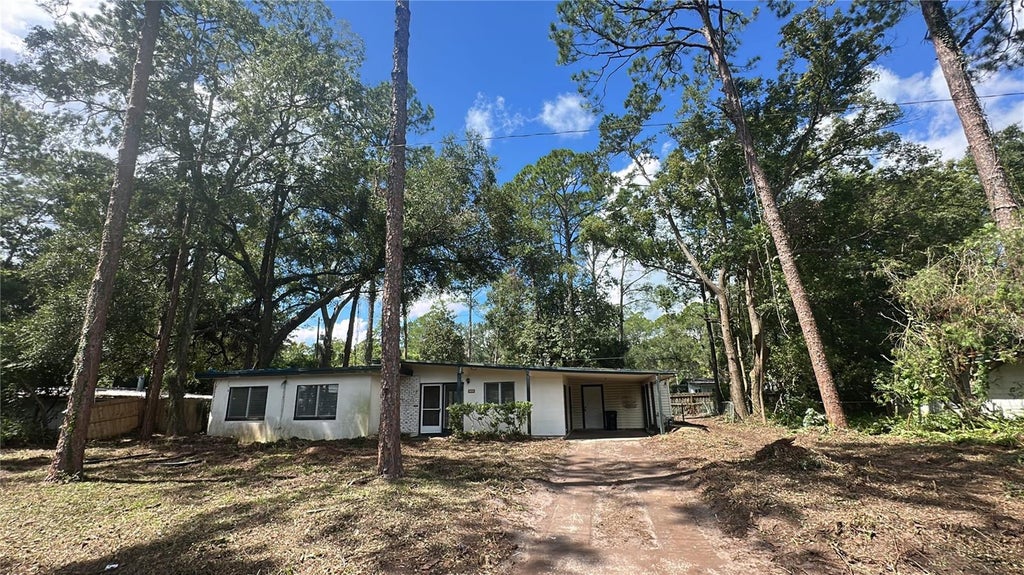 Photo of 2002 NE 7th Terrace, Gainesville, FL 32609 (MLS # O6443360)