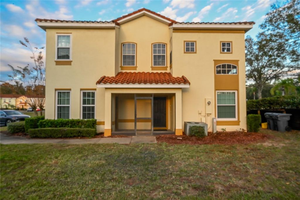 Photo of 704 Monroe Circle, Davenport, FL 33896 (MLS # G5105399)