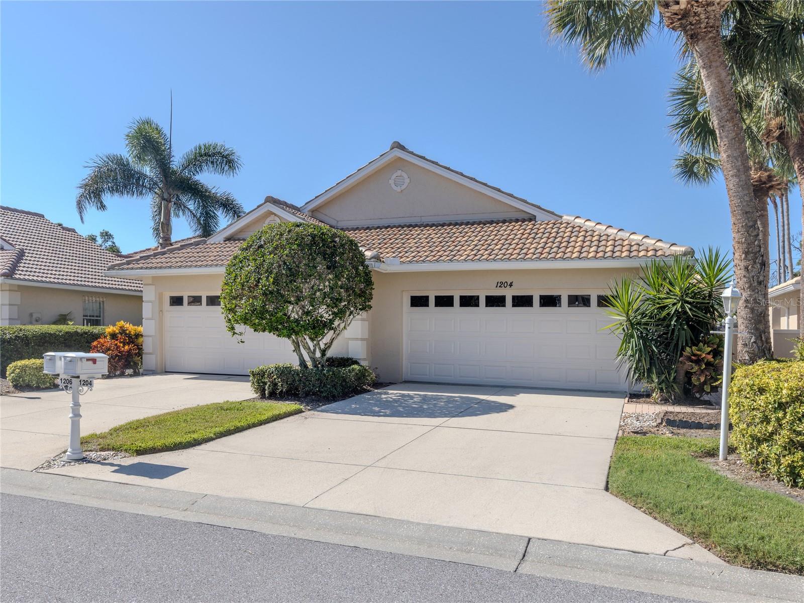 BERKSHIRE PLACE WATERFORD VENICE. Surrounded by greenspace and walking paths, this community has everything you need. 2 Bedroom 2 Bathrooms PLUS DEN/office. MOVE IN READY. As you step outside, you'll love the convenience of your private mailbox right in front at your driveway and JUST A FEW STEPS TO THE POOL. PRIVATE LANAI. Coat Closet, High Ceilings, Rounded Corners, Arched Entry at the Den, Plant Shelves. Plenty of Cabinetry in the kitchen. Closet Pantry. Linen Closet Thoughtfully designed split floor plan ensures privacy. The Den features a custom built desk that also doubles up as a sleeper bed. The primary bedroom is spacious with a bay window facing south, an en-suite bathroom with a beautifully updated walk-in shower, and a WALK IN CLOSET. Extra storage space in both baths and inside laundry. Attached TWO CAR GARAGE with plenty of shelving and more storage space. Plenty of room for your grill in your private courtyard. Pet Friendly. Hot water heater 2018. AC 2018 with UV Lamp. TILE ROOF 2024 WITH TRANSFERABLE WARRANTY. Exterior painted 2024. No CDD fees. Berkshire Place is a SMALL WELL MAINTAINED GATED COMMUNITY including lawn care maintenance, shrubs and tree trimming, irrigation, community pools. All centrally located minutes to Venice Island, Nokomis, Sarasota, Gulf beaches, Shopping, Theatres, Restaurants, Highways, Airports, and the new Sarasota Memorial Hospital. Plenty of recreational activities at your doorstep and nearby. Enjoy the trails and nature in abundance at Pinebrook Park and Curry Creek Preserve. A perfect full time residence or part time retreat.