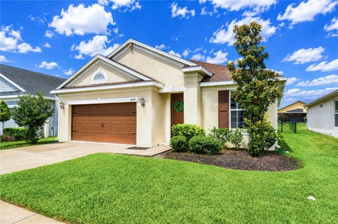 Photo of 4749 Rolling Green Drive, Wesley Chapel, FL 33543 (MLS # TB8534708)