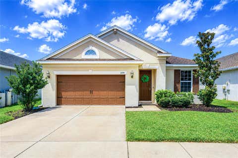 Photo of 4749 Rolling Green Drive, Wesley Chapel, FL 33543 (MLS # TB8534708)